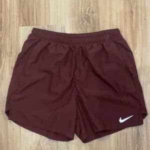 Maroon Nike 5” inseam shorts. Worn less than 5 times